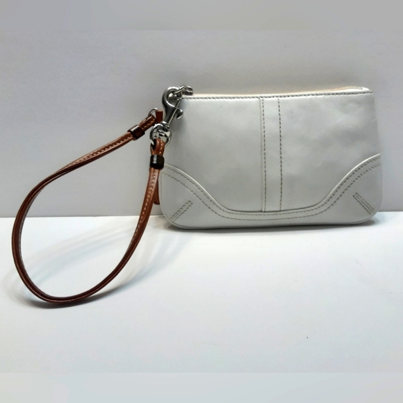 Coach Handbags - Coach white leather side zipper wristlet